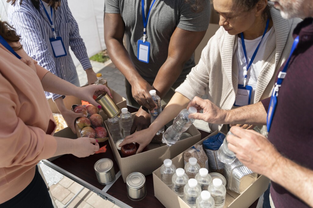 Citizens volunteer to organize a food bank where they distribute food to members in their community. The idea on the food bank surfaced during an Appreciative Inquiry Community Development session.